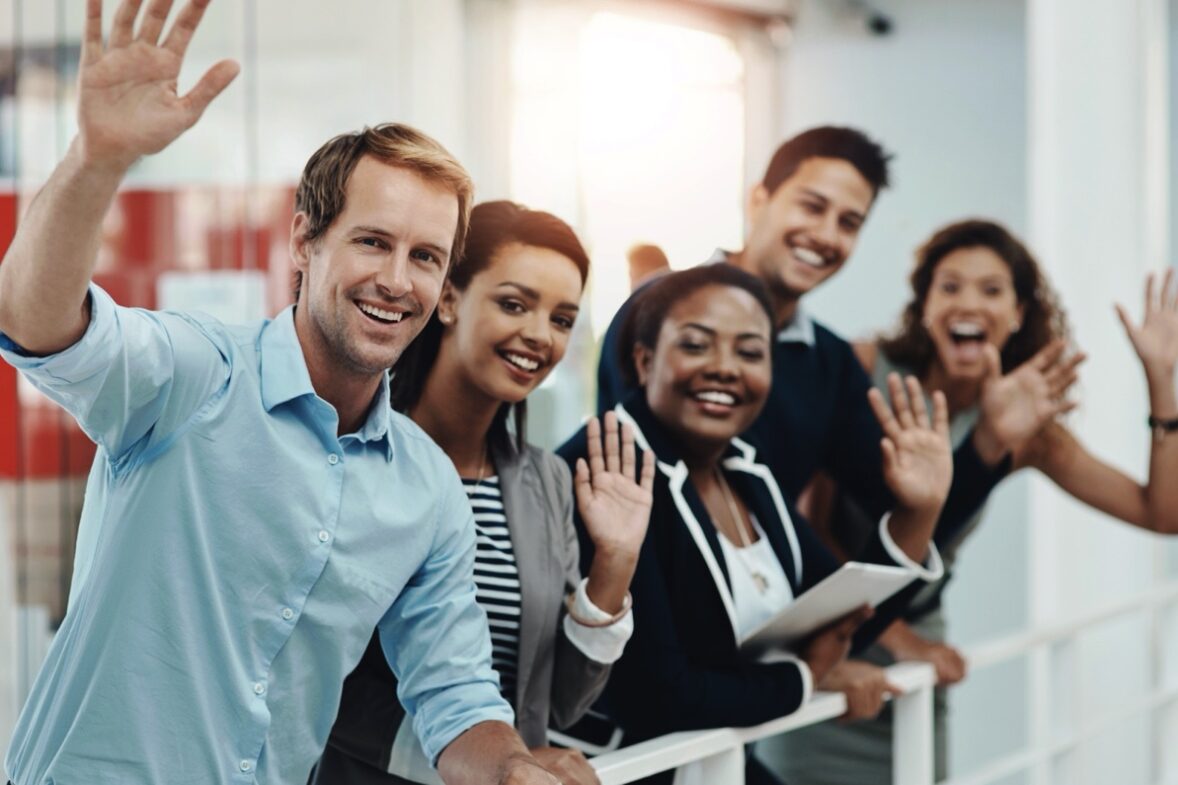 Excited Team Waving